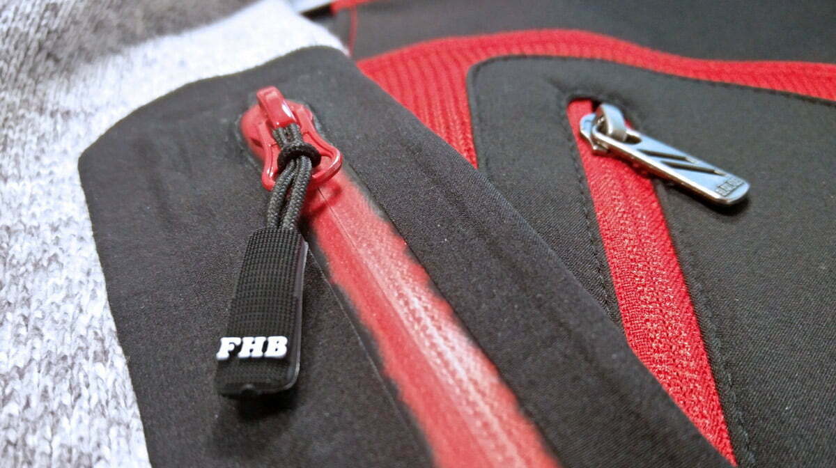 Détails des poches imperméables de la polaire FHB et de la veste Blaklader